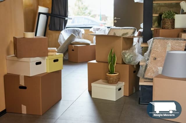 Neatly stacked boxes in a client's new home