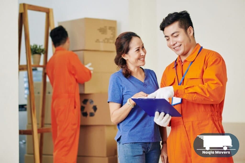 A happy customer during her home move handled by Naqla Movers